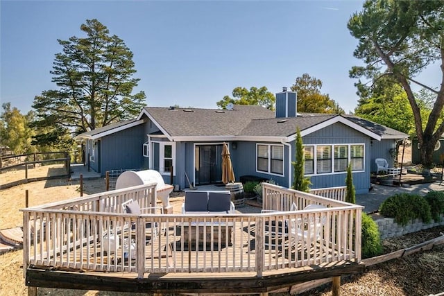 5175 White Tail Pl, Paso Robles, CA 93446 - rear view of house with a deck, a chimney, and roof with shingles