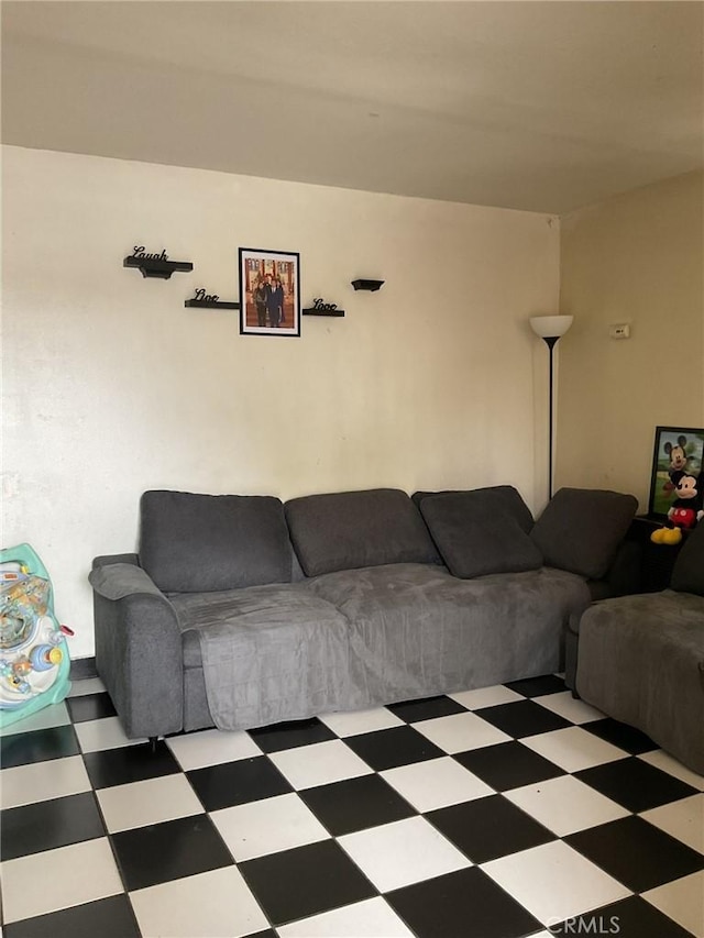 4465 Lovett St, Commerce, CA 90040 - living room featuring tile patterned floors