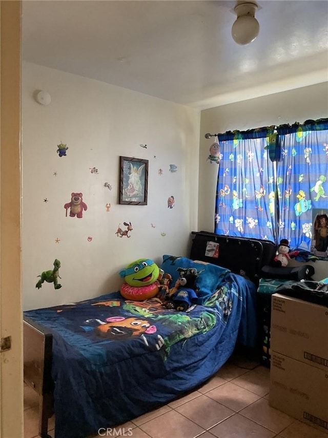 4465 Lovett St, Commerce, CA 90040 - bedroom with tile patterned floors