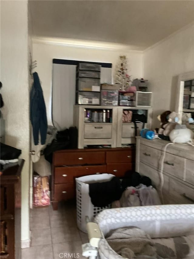 4465 Lovett St, Commerce, CA 90040 - bedroom with tile patterned flooring and ornamental molding