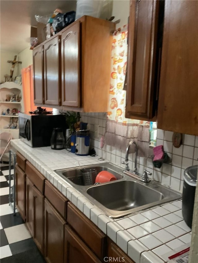 4465 Lovett St, Commerce, CA 90040 - kitchen with decorative backsplash and tile patterned floors
