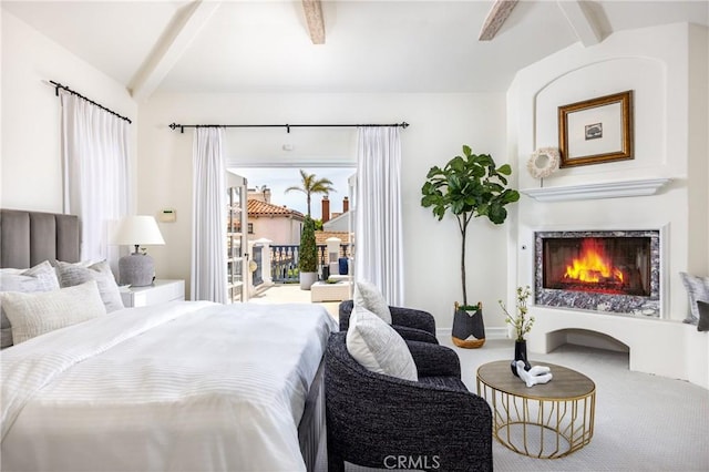 104 Via Lorca, Newport Beach, CA 92663 - carpeted bedroom featuring a lit fireplace