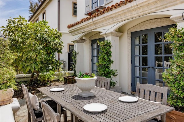 104 Via Lorca, Newport Beach, CA 92663 - view of patio with french doors and outdoor dining space