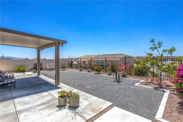 1563 Sunswept Way, Beaumont, CA 92223 - fenced backyard with a patio