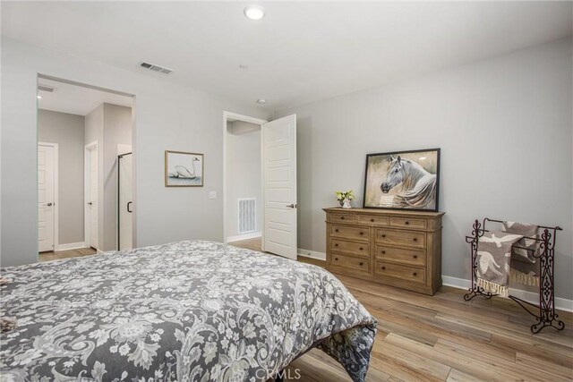 1563 Sunswept Way, Beaumont, CA 92223 - bedroom featuring light wood finished floors and recessed lighting