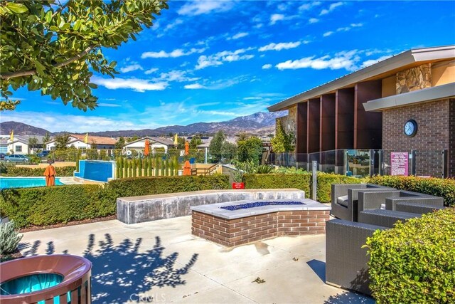 1563 Sunswept Way, Beaumont, CA 92223 - view of patio featuring a mountain view