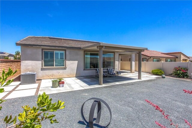 1563 Sunswept Way, Beaumont, CA 92223 - back of house featuring stucco siding and a patio
