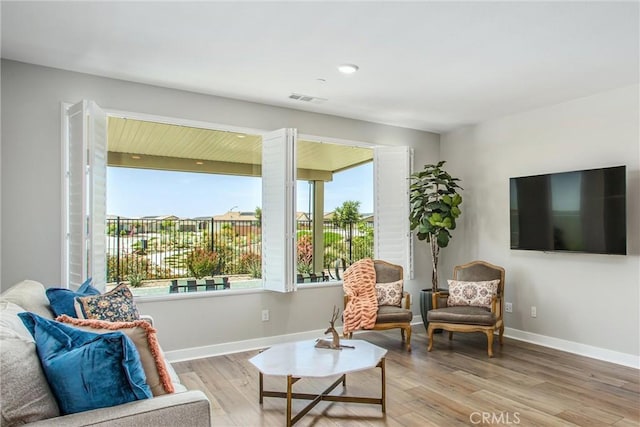 1563 Sunswept Way, Beaumont, CA 92223 - sitting room featuring light wood-type flooring and baseboards
