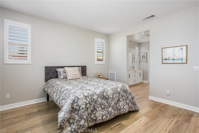 1563 Sunswept Way, Beaumont, CA 92223 - bedroom featuring light wood finished floors and baseboards