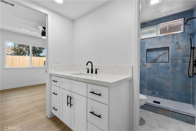 13635 Frady Ave, Chino, CA 91710 - full bath with a shower stall, vanity, ceiling fan, and wood finished floors