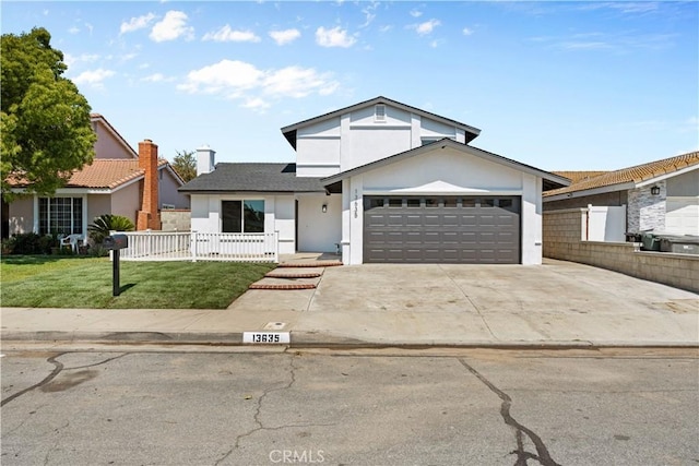 13635 Frady Ave, Chino, CA 91710 - traditional-style home with an attached garage, stucco siding, and driveway