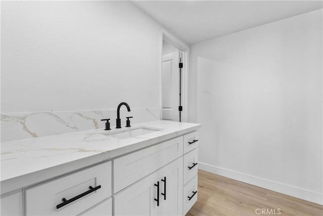 13635 Frady Ave, Chino, CA 91710 - bathroom with wood finished floors and vanity