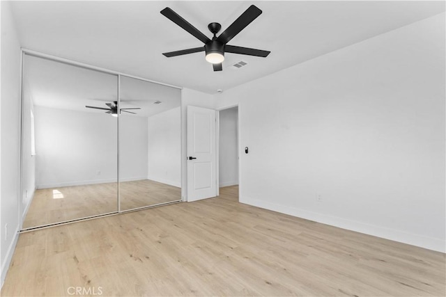 13635 Frady Ave, Chino, CA 91710 - unfurnished bedroom with wood finished floors, a closet, and ceiling fan