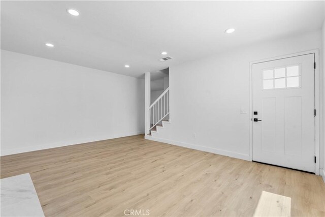 13635 Frady Ave, Chino, CA 91710 - foyer with stairway, light wood-style floors, and recessed lighting