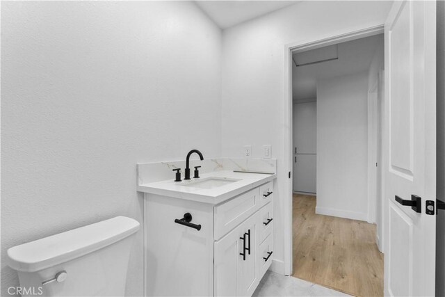 13635 Frady Ave, Chino, CA 91710 - half bath with vanity and wood finished floors