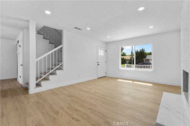 13635 Frady Ave, Chino, CA 91710 - foyer entrance with stairway, recessed lighting, and light wood finished floors