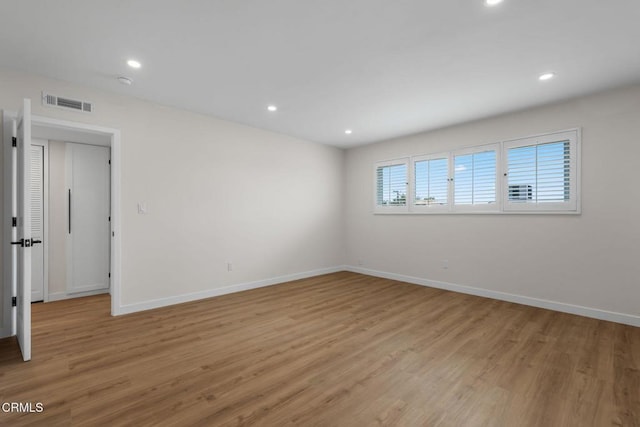 1200 W Huntington Dr Unit 21, Arcadia, CA 91007 - empty room featuring light wood finished floors, recessed lighting, and a smoke detector