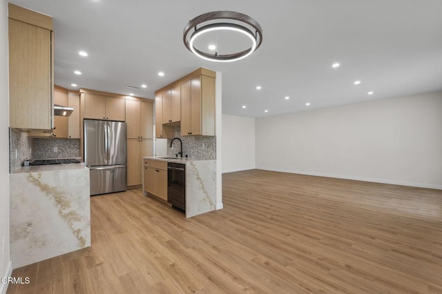 1200 W Huntington Dr Unit 21, Arcadia, CA 91007 - kitchen with freestanding refrigerator, black dishwasher, tasteful backsplash, recessed lighting, and light wood-style floors