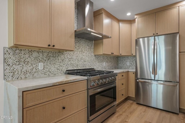 1200 W Huntington Dr Unit 21, Arcadia, CA 91007 - kitchen with appliances with stainless steel finishes, wall chimney exhaust hood, light brown cabinets, light wood finished floors, and decorative backsplash