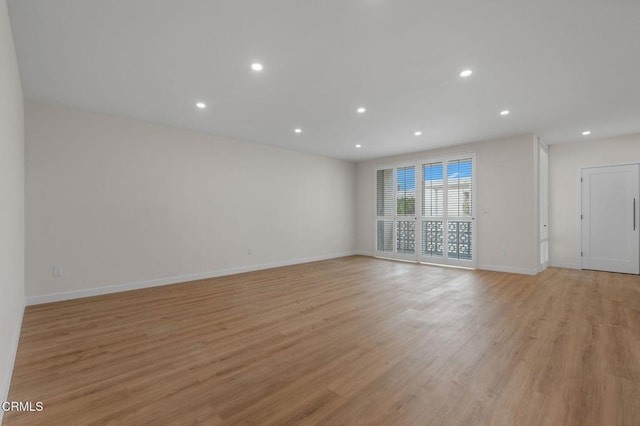 1200 W Huntington Dr Unit 21, Arcadia, CA 91007 - empty room with light wood-style flooring and recessed lighting