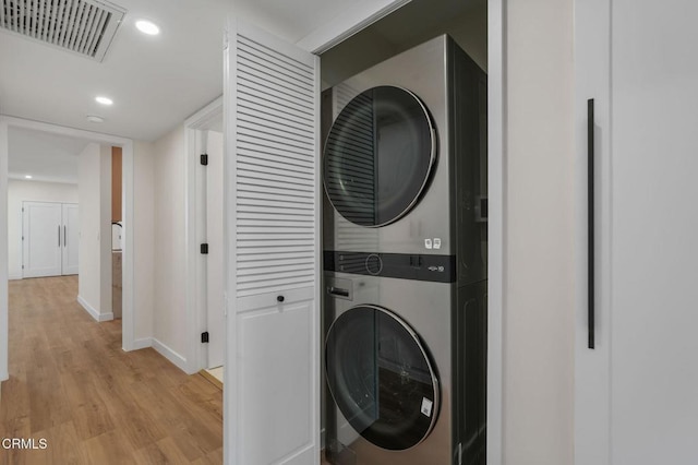 1200 W Huntington Dr Unit 21, Arcadia, CA 91007 - washroom with estacked washer and dryer, light wood finished floors, and recessed lighting