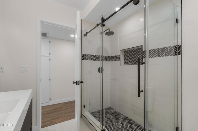 1200 W Huntington Dr Unit 21, Arcadia, CA 91007 - bathroom with a stall shower, vanity, recessed lighting, and wood finished floors