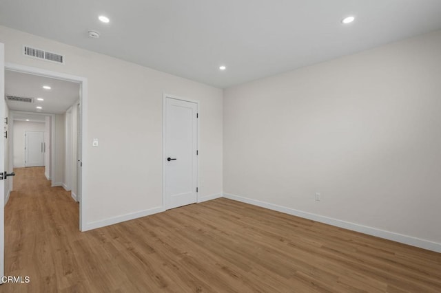 1200 W Huntington Dr Unit 21, Arcadia, CA 91007 - unfurnished bedroom featuring light wood finished floors and recessed lighting