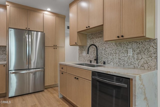 1200 W Huntington Dr Unit 21, Arcadia, CA 91007 - kitchen featuring stainless steel appliances, light brown cabinetry, decorative backsplash, light wood-style floors, and recessed lighting