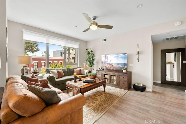 355 N Cleveland St Unit 211, Oceanside, CA 92054 - living area featuring light wood-style flooring and a ceiling fan