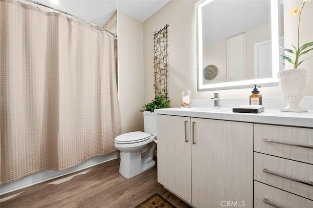 355 N Cleveland St Unit 211, Oceanside, CA 92054 - full bathroom with wood finished floors, vanity, and a shower with shower curtain