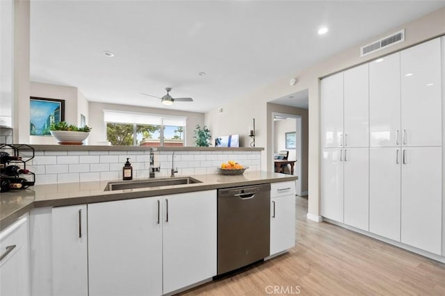 355 N Cleveland St Unit 211, Oceanside, CA 92054 - kitchen featuring dishwasher, decorative backsplash, light wood finished floors, white cabinets, and recessed lighting