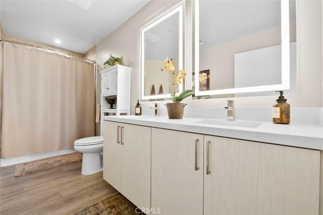 355 N Cleveland St Unit 211, Oceanside, CA 92054 - bathroom with double vanity and wood finished floors