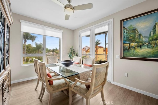 355 N Cleveland St Unit 211, Oceanside, CA 92054 - dining room featuring light wood-type flooring and a ceiling fan