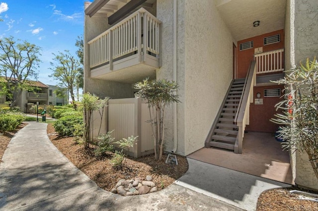 9959 Azuaga St Unit 105, San Diego, CA 92129 - entrance to property featuring stucco siding
