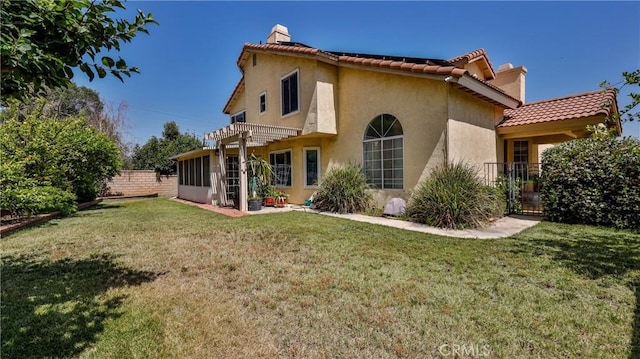 25961 Brookmere Ave, Loma Linda, CA 92354 - back of property featuring stucco siding, a tiled roof, a chimney, and a pergola