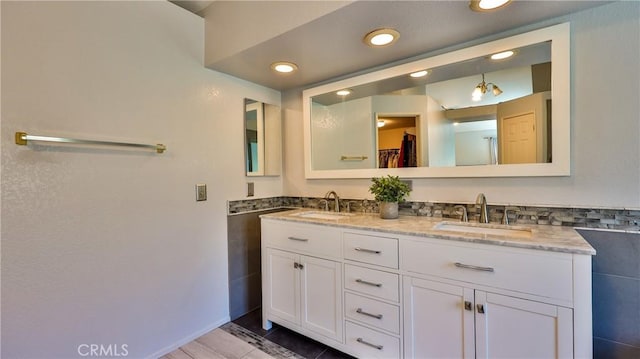 25961 Brookmere Ave, Loma Linda, CA 92354 - full bathroom with double vanity, tile patterned flooring, recessed lighting, and a walk in closet