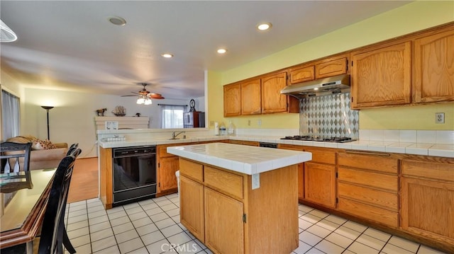 25961 Brookmere Ave, Loma Linda, CA 92354 - kitchen featuring dishwasher, under cabinet range hood, gas stovetop, a ceiling fan, and tile counters