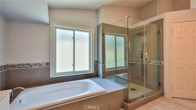 25961 Brookmere Ave, Loma Linda, CA 92354 - bathroom featuring a garden tub, plenty of natural light, and a shower stall
