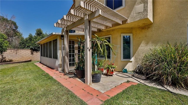 25961 Brookmere Ave, Loma Linda, CA 92354 - doorway to property with stucco siding, a pergola, and a patio
