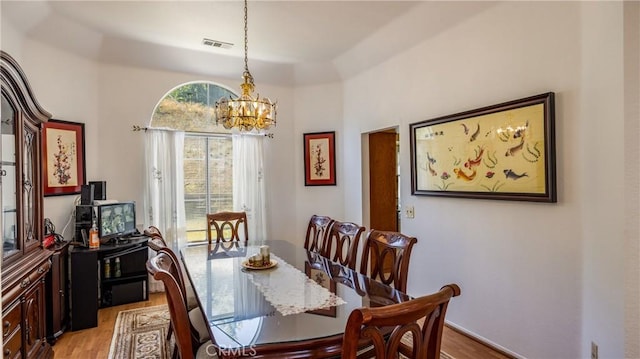 25961 Brookmere Ave, Loma Linda, CA 92354 - dining space featuring a chandelier and light wood-style flooring