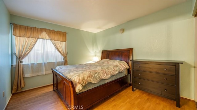 25961 Brookmere Ave, Loma Linda, CA 92354 - bedroom featuring light wood finished floors and baseboards