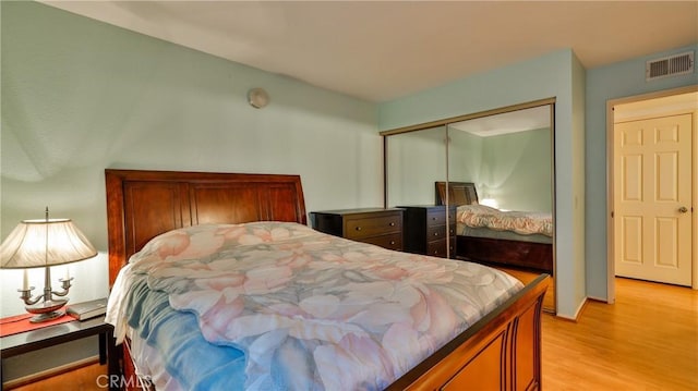 25961 Brookmere Ave, Loma Linda, CA 92354 - bedroom featuring light wood finished floors and a closet