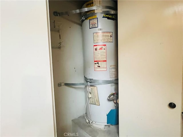 13500 Ramona Pkwy, Baldwin Park, CA 91706 - utility room with secured water heater