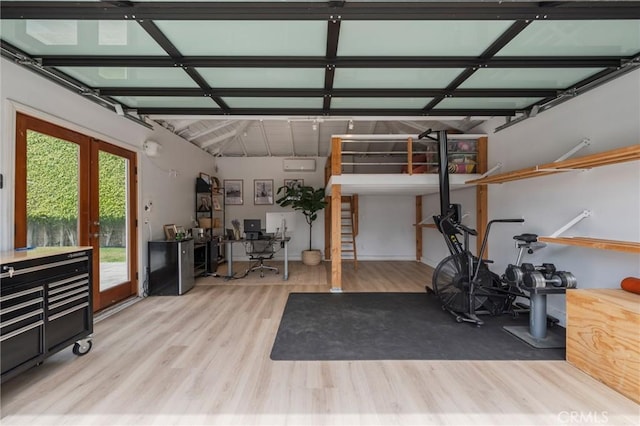7838 Stewart Ave, Los Angeles, CA 90045 - workout room with wood finished floors and a garage