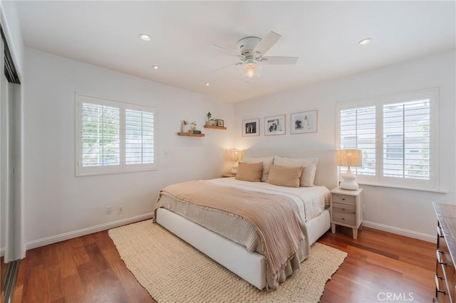 7838 Stewart Ave, Los Angeles, CA 90045 - bedroom with multiple windows, wood finished floors, recessed lighting, and a ceiling fan