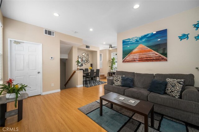 1879 Atlantic Ave Unit 15, Long Beach, CA 90806 - living room with light wood-style floors, recessed lighting, and ceiling fan