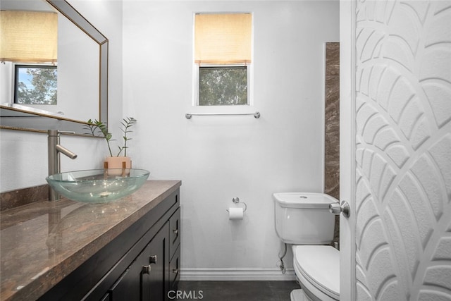 1879 Atlantic Ave Unit 15, Long Beach, CA 90806 - bathroom featuring toilet and vanity