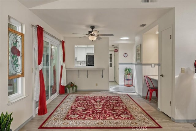 520 Wilshire Ct, Chico, CA 95973 - foyer featuring ceiling fan, plenty of natural light, and light wood-style flooring