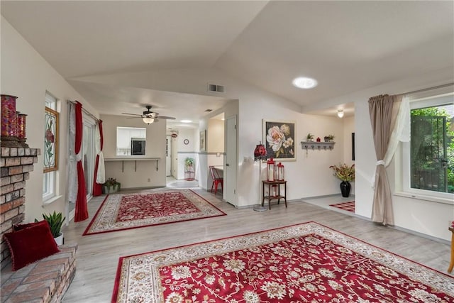 520 Wilshire Ct, Chico, CA 95973 - living area with lofted ceiling, wood finished floors, and a ceiling fan