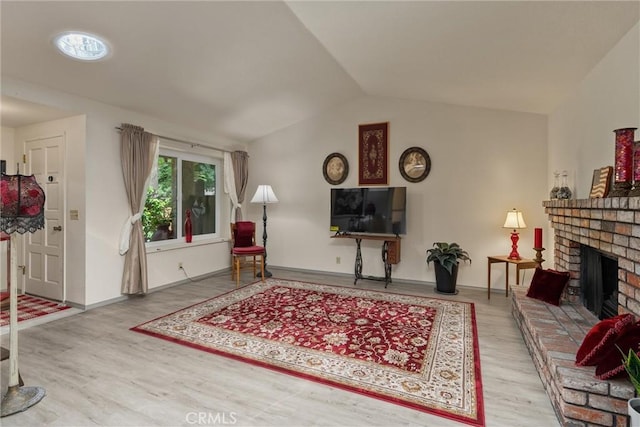 520 Wilshire Ct, Chico, CA 95973 - living area with lofted ceiling, wood finished floors, and a fireplace